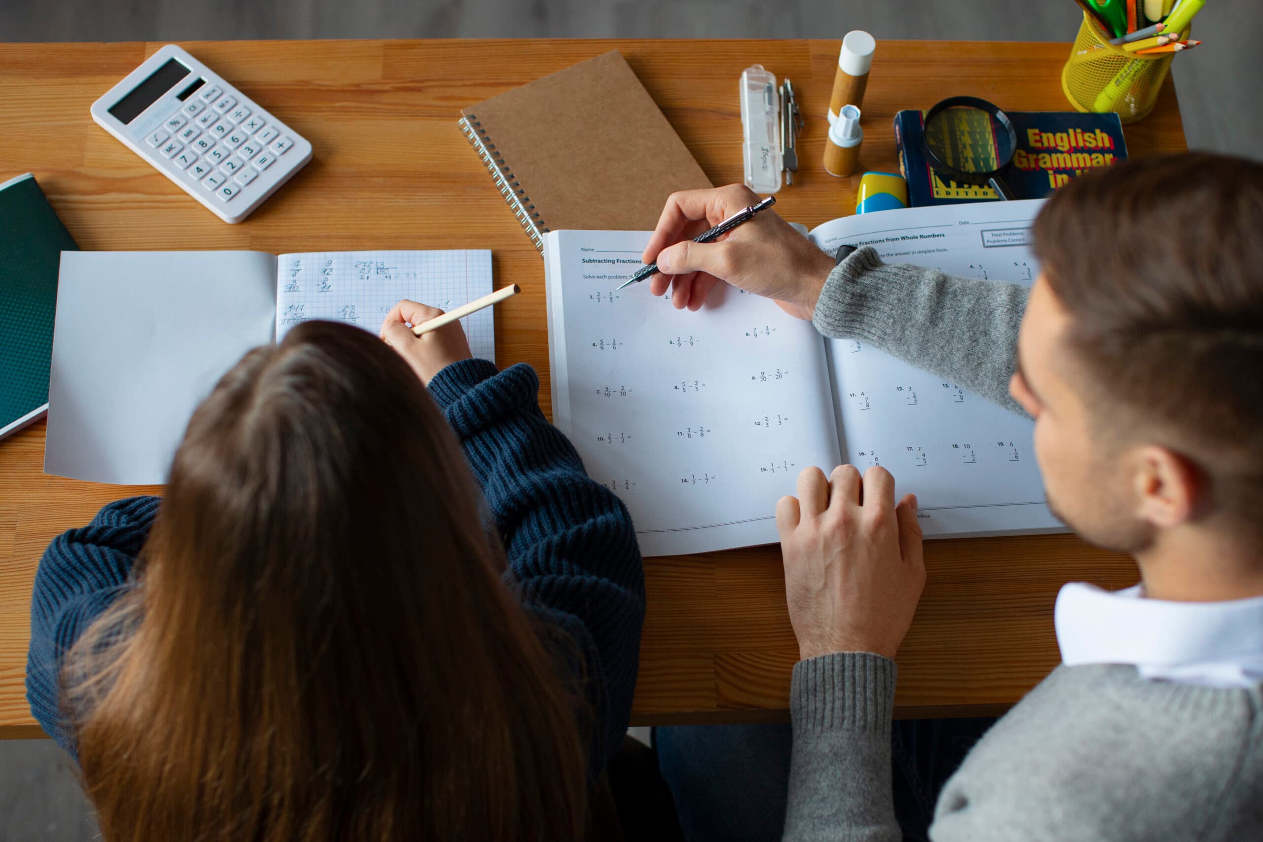 Online mathematics tutoring materials on a desk